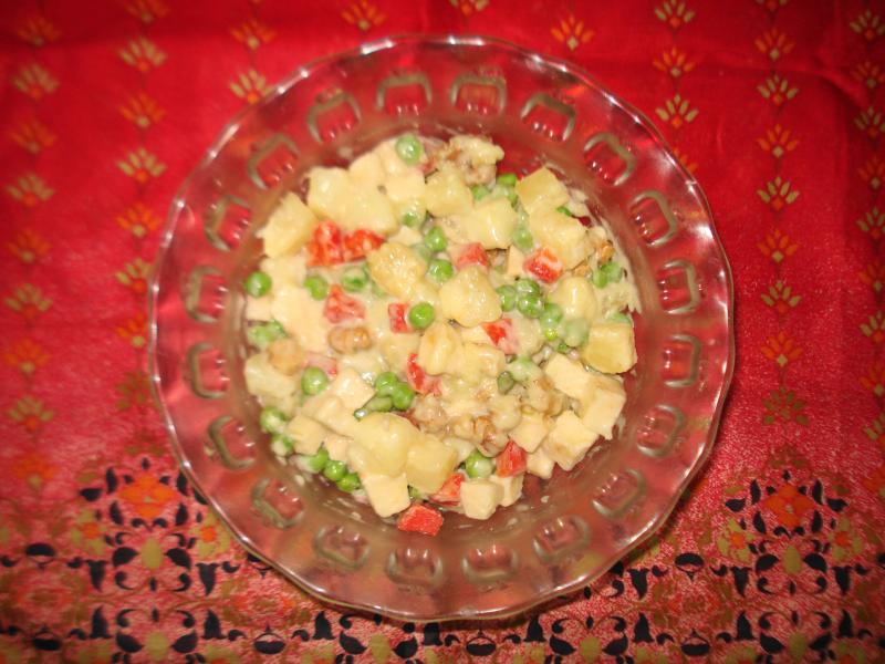 Macédoine de légumes, appertisée, égouttée.