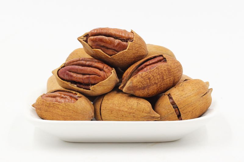 Photo d'une assiette de noix de pécan..