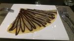  image de l'aliment Crêpe maison, fourrée au chocolat ou à la pâte à tartiner chocolat et noisettes