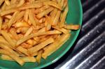  image de l'aliment Frites de pommes de terre, surgelées, rôties/cuites au four