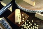  image de l'aliment Fromage à pâte ferme environ 14% MG type Masdaam à teneur réduite en MG
