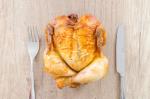  image de l'aliment Poulet, cuisse, viande et peau, rôtie/cuite au four