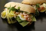  image de l'aliment Sandwich baguette, oeuf, crudités (tomate, salade), mayonnaise
